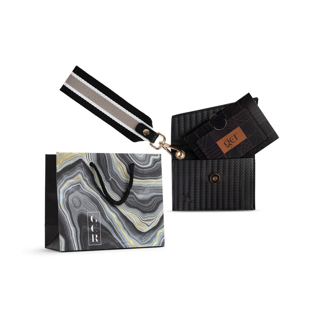 Gift Card Registry card in a black mini purse with strap